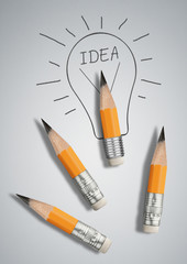 successful idea concept, pencils with drawn bulb