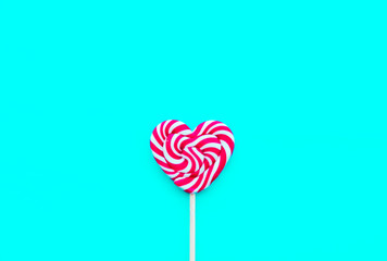 Red valentine day hearth shape lollipop on the Tiffany blue background
