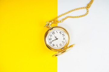 Pocket watch with yellow background