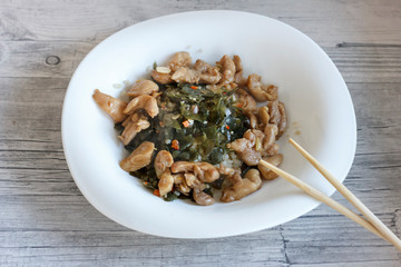 Japanese salad with sea kale, chicken fillet and boiled rice