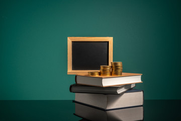Chalkboard and stalking books with low light