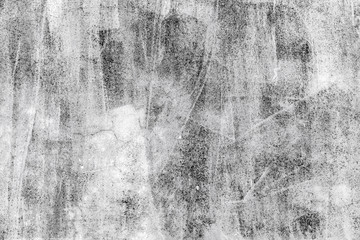 Gray concrete wall with white paint