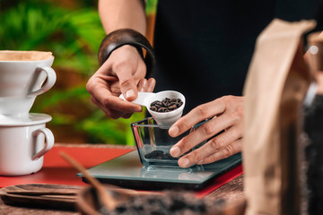 Fototapeta na wymiar Filter Coffee. Weighing Coffee For Making Drip Coffee