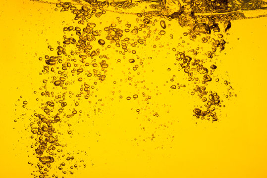 Motion of bubble oil liquid or beer  juice syrup yellow color for background