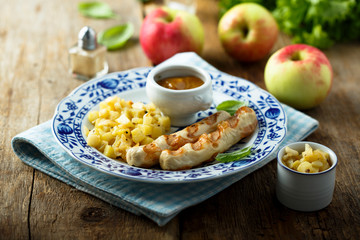 Grilled sausages with potato apple salad