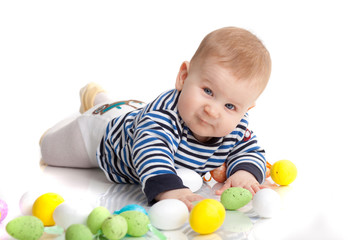 Fototapeta na wymiar portrait of a cute baby boy smiling on white background isolated