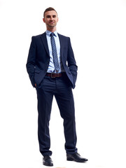 business, people and office concept - happy smiling businessman in suit