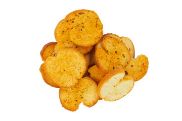 Handful of spicy fried bread croutones isolated on white.