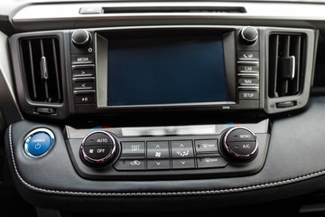 Luxury prestige car interior, dashboard, steering wheel.