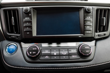 Luxury prestige car interior, dashboard, steering wheel.