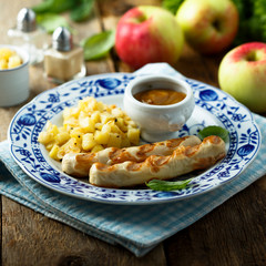 Grilled sausages with potato apple salad