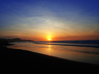 Fototapeta premium The beautiful and stunning sunset view along the seashore.