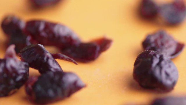 falling dried cranberries in clow motion healthy