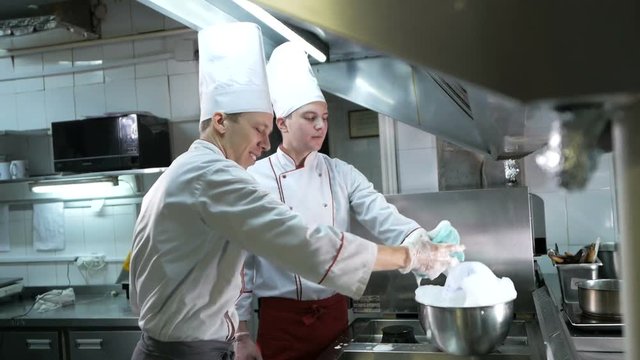 Sanitary day. Cooks wash oven, stove and extractor in the restaurant