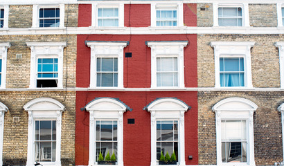 Beautiful colorful houses facades in Notting Hill