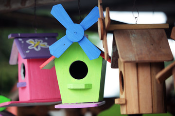 Obraz na płótnie Canvas colorful wooden bird house background.