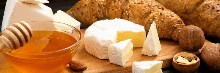 slices of cheese brie or camembert with croissants