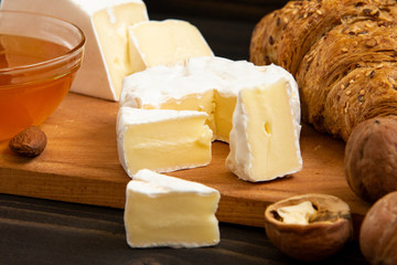 slices of cheese brie or camembert with croissants