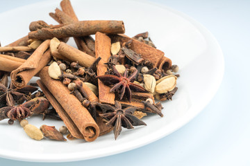 Cinnamon close up with white background.