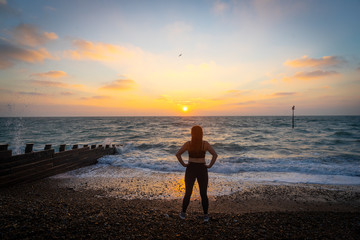 silhouette of woman at sunrise motivational