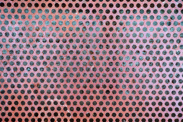 metal old background with holes with round holes