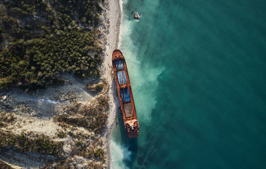 GELENDZHIK, RUSSIA - JAN 19, 2018: The ship called Rio ran aground after a storm in the black sea. Aerial view.