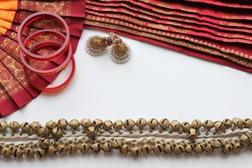 Indian decorations for dancing: bracelets, bells for the legs - ganguru, earrings and elements of the Indian classical costume for dancing bharatanatyam.