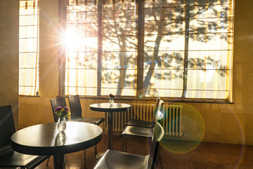 table and chair with indoor view.