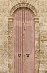 Fototapeta na wymiar Old vintage closed wooden door