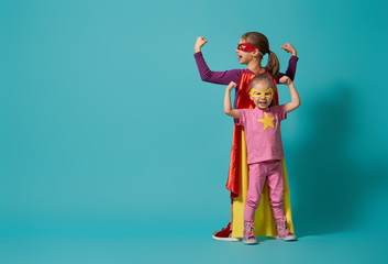 children playing superhero