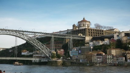 Famous Bridge And Old Monastery Over Douro River, Portugal. Porto is one of the oldest European centres, and its historical core was proclaimed a World Heritage Site by UNESCO in 1996