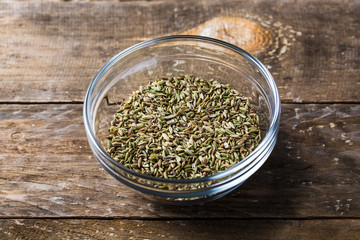 Closeup of fennel seeds in a glass bowl 