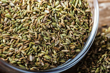 Closeup of fennel seeds in a glass bowl 