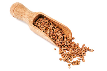 buckwheat in wooden spoon on white