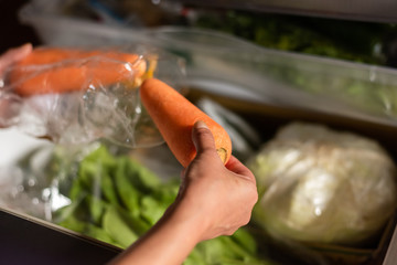 take vegetables from refrigerator