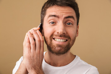 Obraz premium Portrait of a smiling young man casually dressed