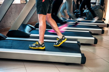 legs on a treadmill