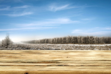 Table background of free space and winter landscape 