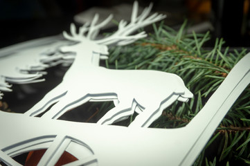 Christmas deer, trees and snowflakes of paper