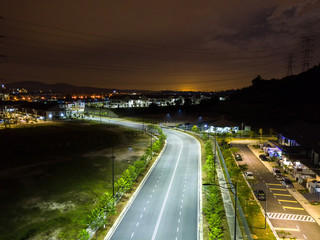 Aerial view of residential houses in night light.