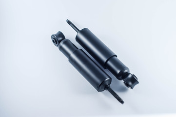 car shock absorber on white background