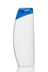 White shampoo bottle with blue cap on white background