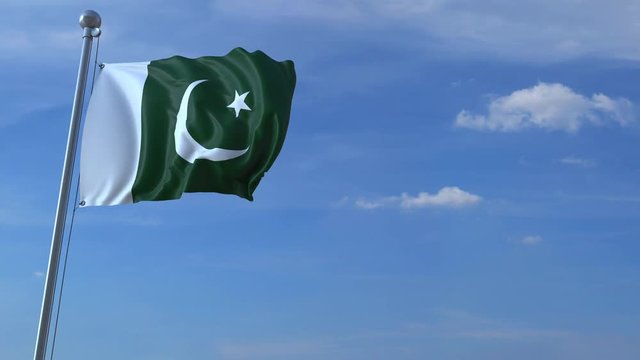Commercial airplane landing behind waving Pakistani flag. Travel to Pakistan conceptual animation