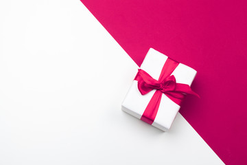 Gift box, red paper hearts . Valentine's Day absctract. Symbol of love. Copy space, flat lay