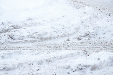 problem after snowfall - snow on the city road, snow porridge