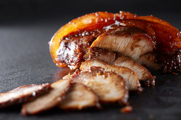 Chinese cuisine, pork barbecued, closeup
