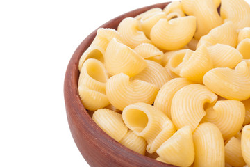 shell pasta in bowl, isolated on white background