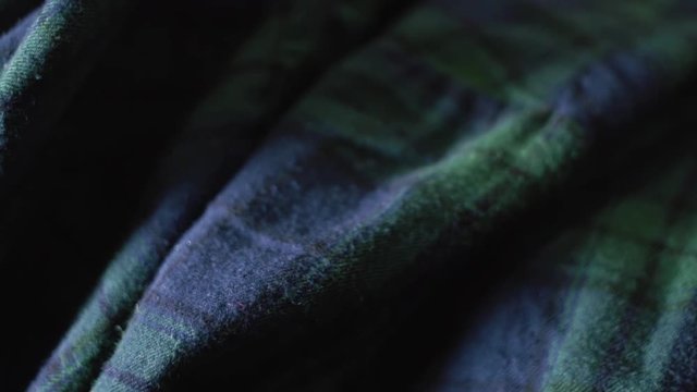Close up of Checkered Flannel Shirt. Green and blue colors.
