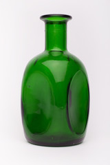 Green wine  bottle on the white background