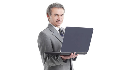 close up.adult businessman looking at laptop screen.isolated on white background